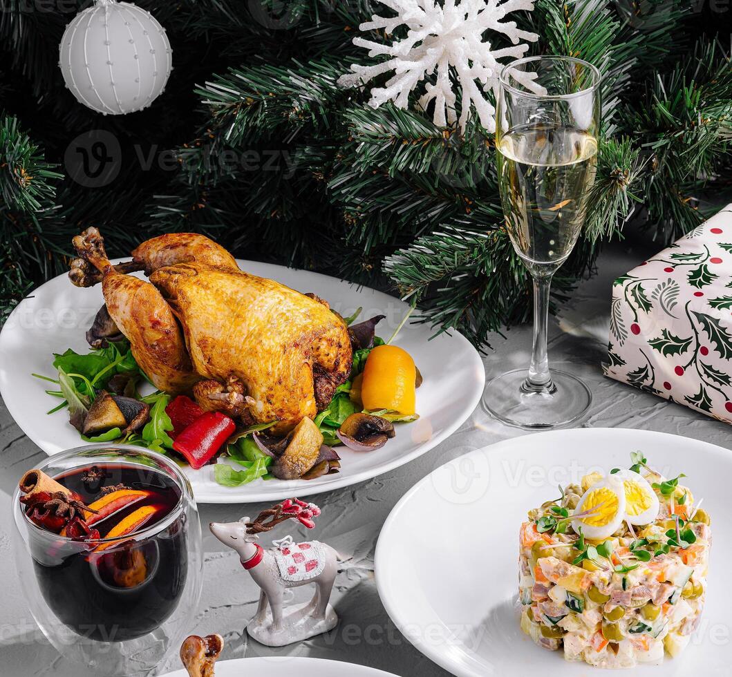 Festive christmas dinner spread with roasted chicken photo
