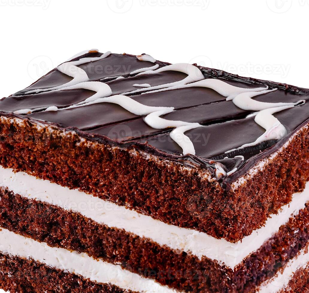 Chocolate cake slice layered with white cream on white background photo