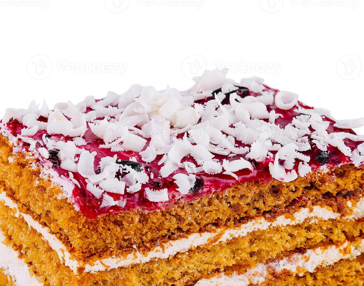Delicious cake with white chocolate topping isolated on white background photo