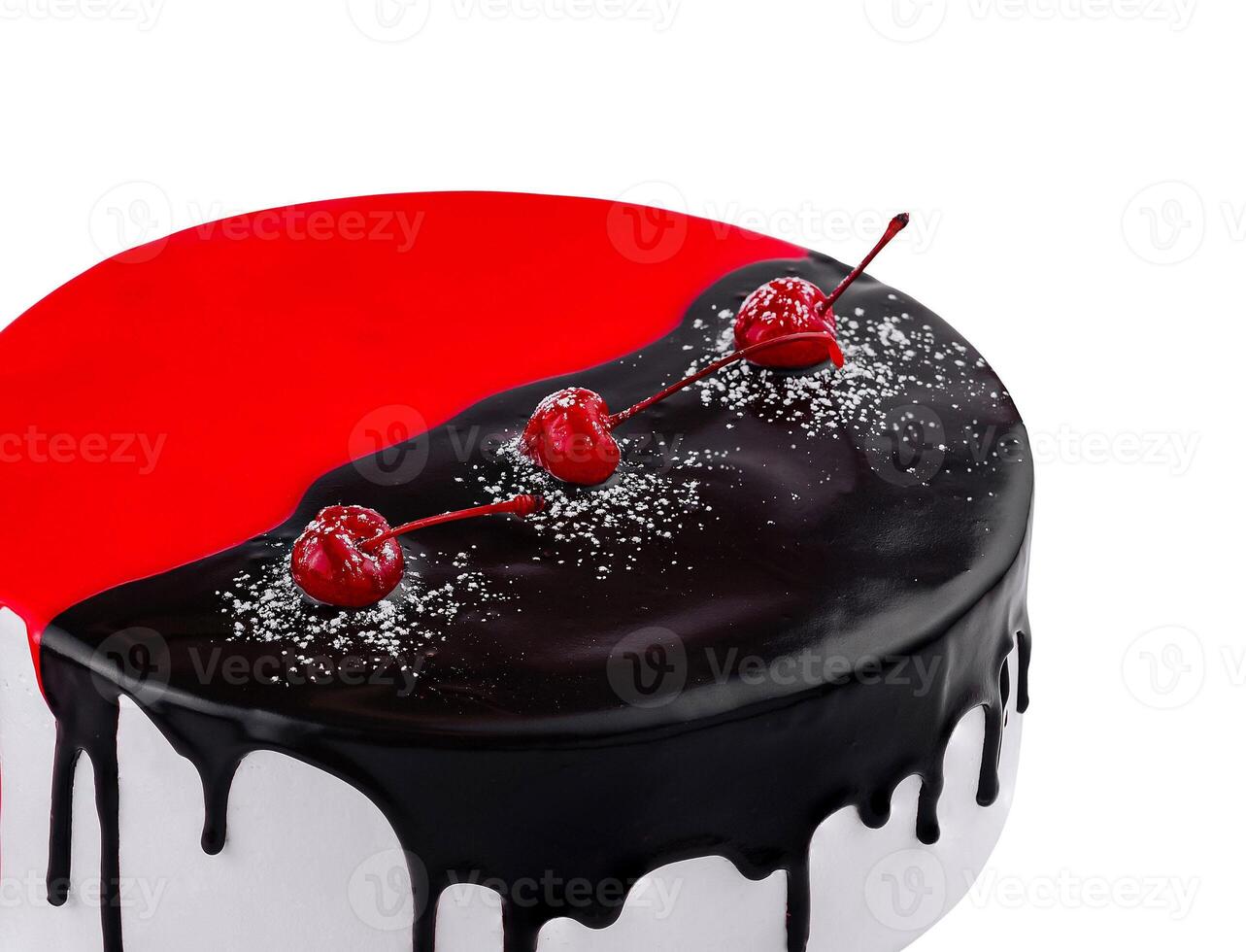 Delicious red and black cake dripping icing with cherries photo