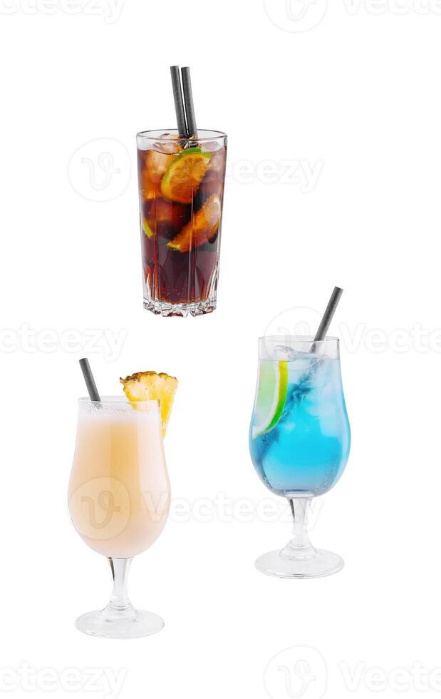 Three colorful cocktails with straws are standing on a bar countertop photo