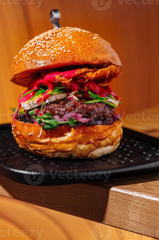 Gourmet veggie burger on stylish tray photo