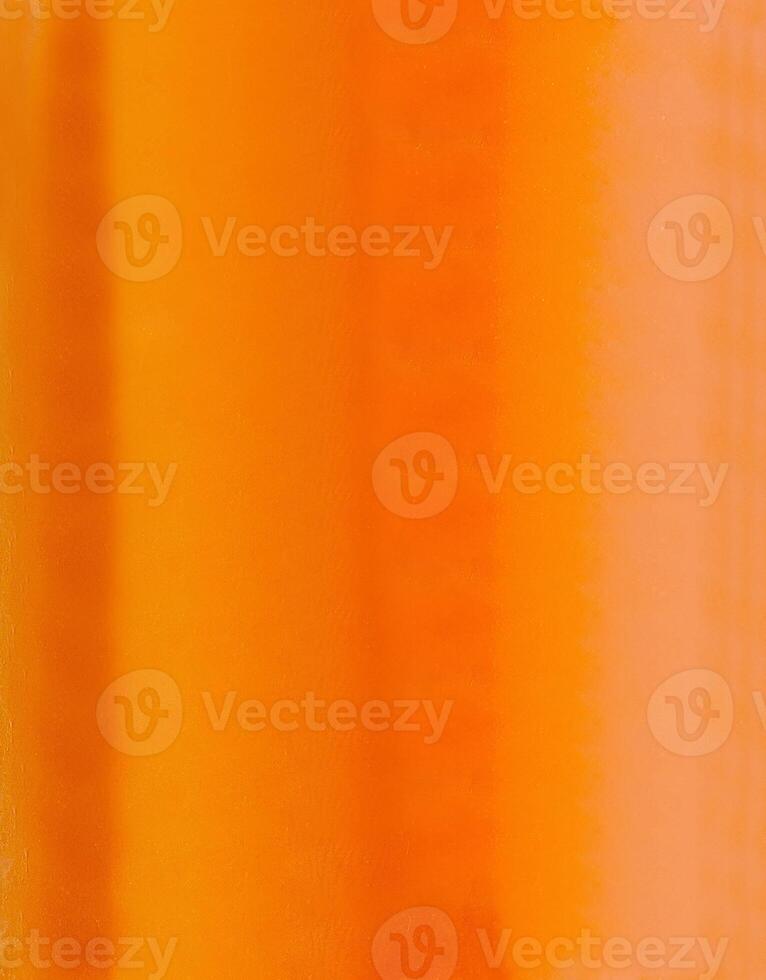 Vibrant orange gradient background creating warm and inviting atmosphere photo
