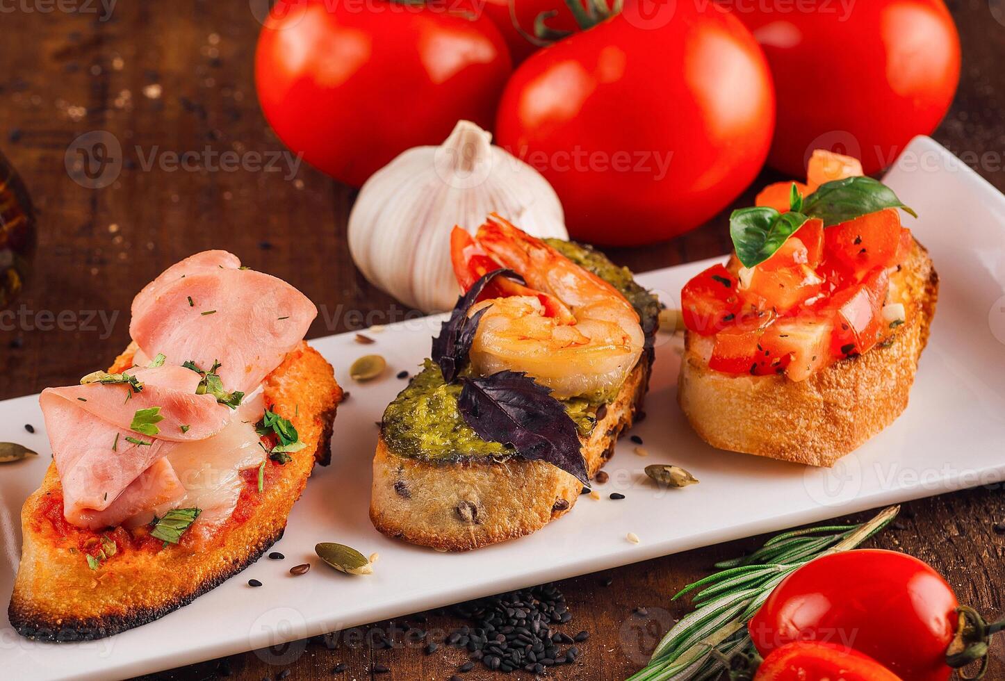 Delicious italian appetizer bruschetta presenting variety of toppings photo