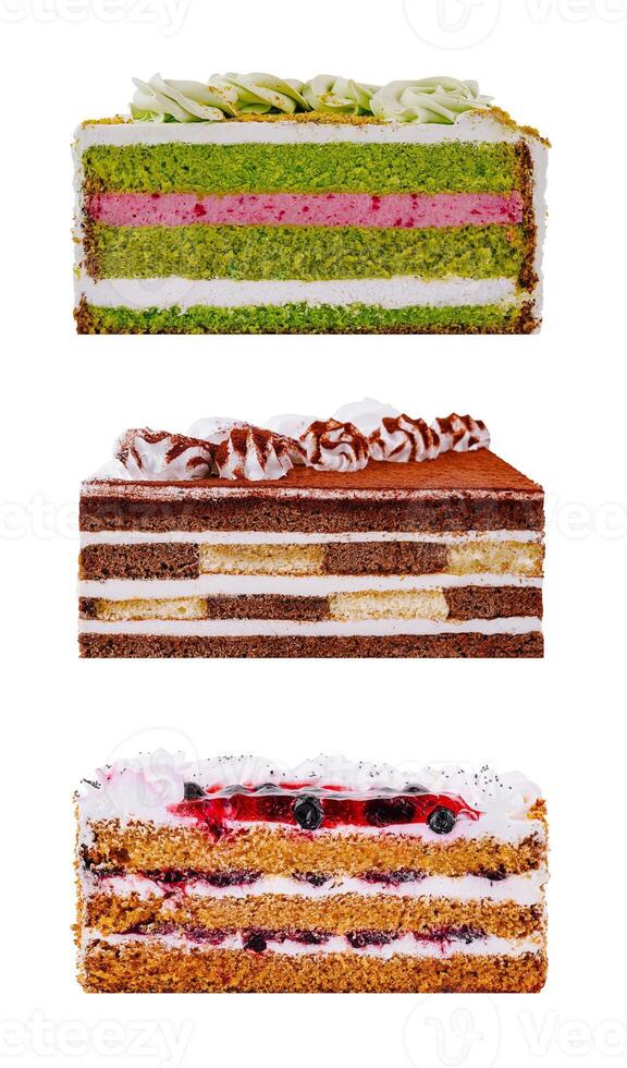 Three delicious slices of layered cake with various toppings photo