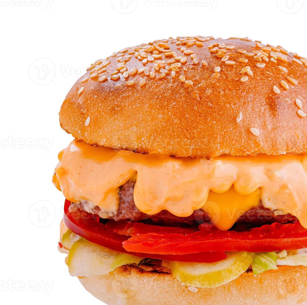 Delicious burger with melted cheese dripping over toppings on white background photo