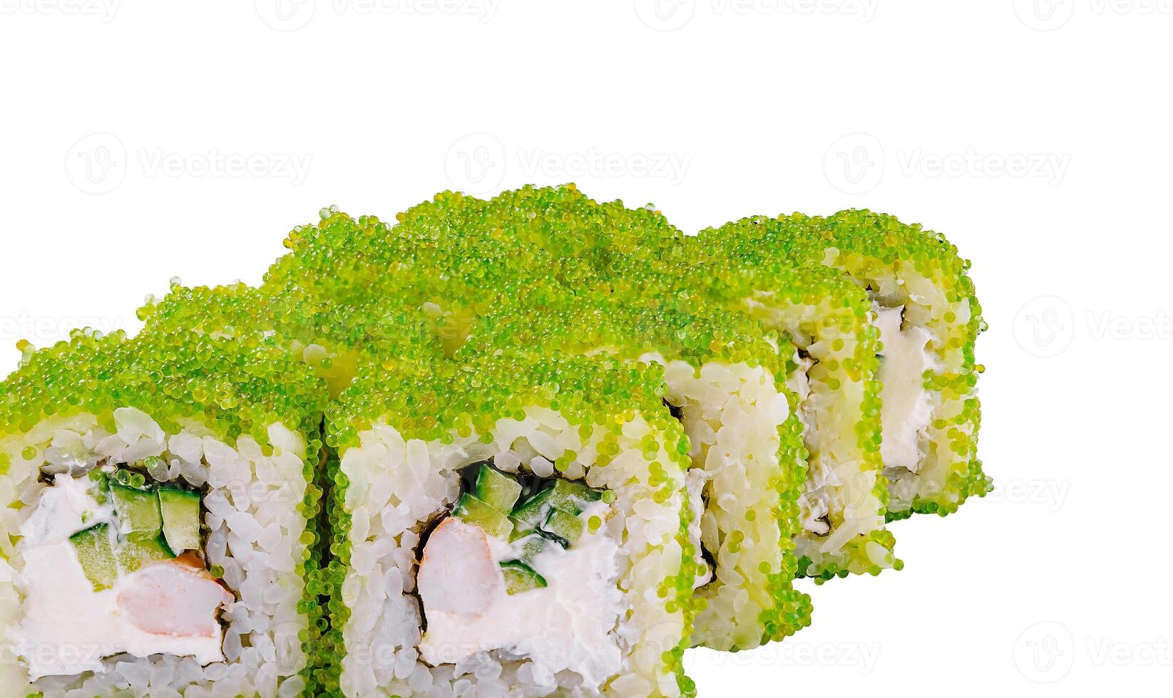 Sushi rolls covered with green tobiko roe showing filling ingredients photo