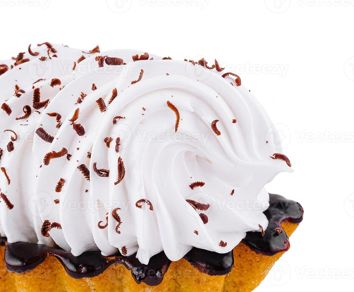 Delicious cake with white cream and chocolate sprinkles on white background photo