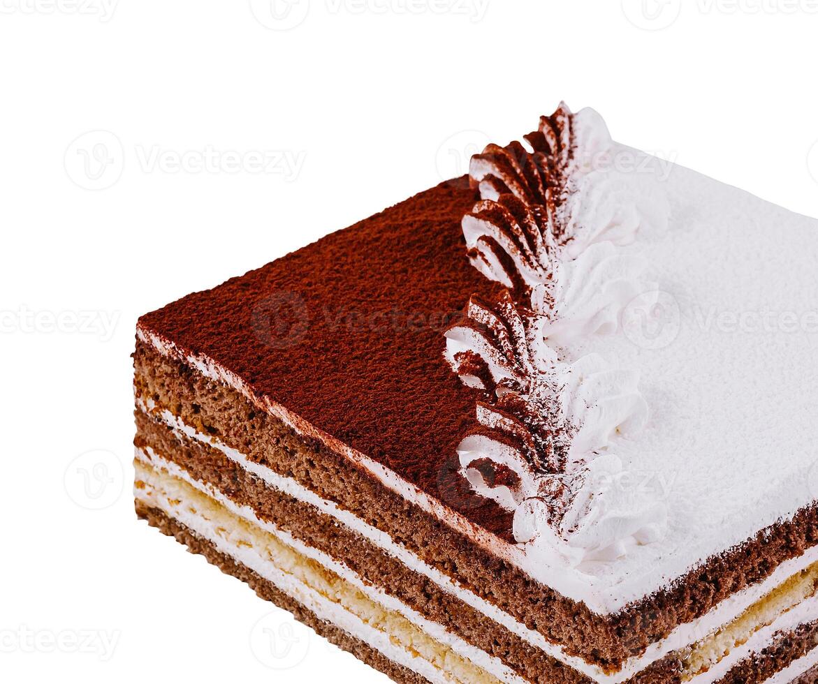 Delicious tiramisu cake with layers of biscuit soaked in coffee and cream decorated with cocoa powder photo