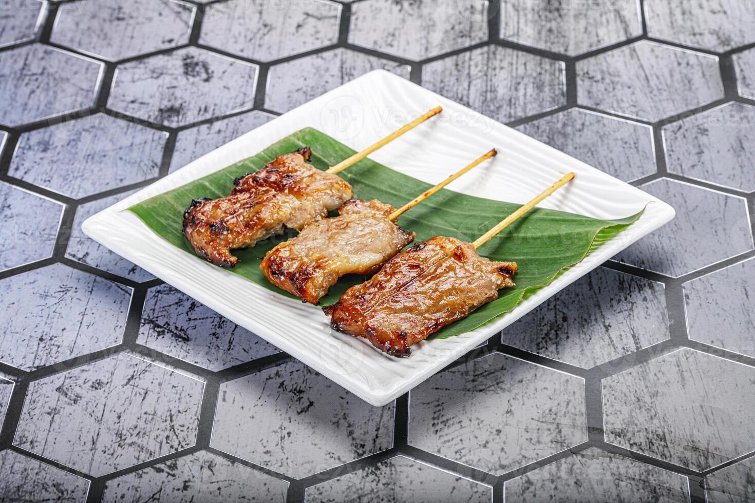Thai cuisine - grilled pork skewer photo