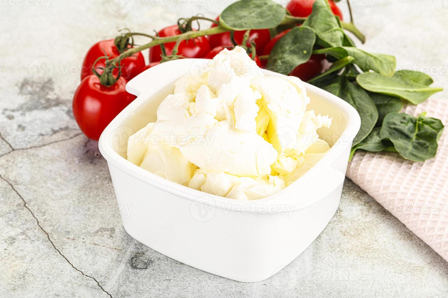 Soft cream cheese in the bowl photo