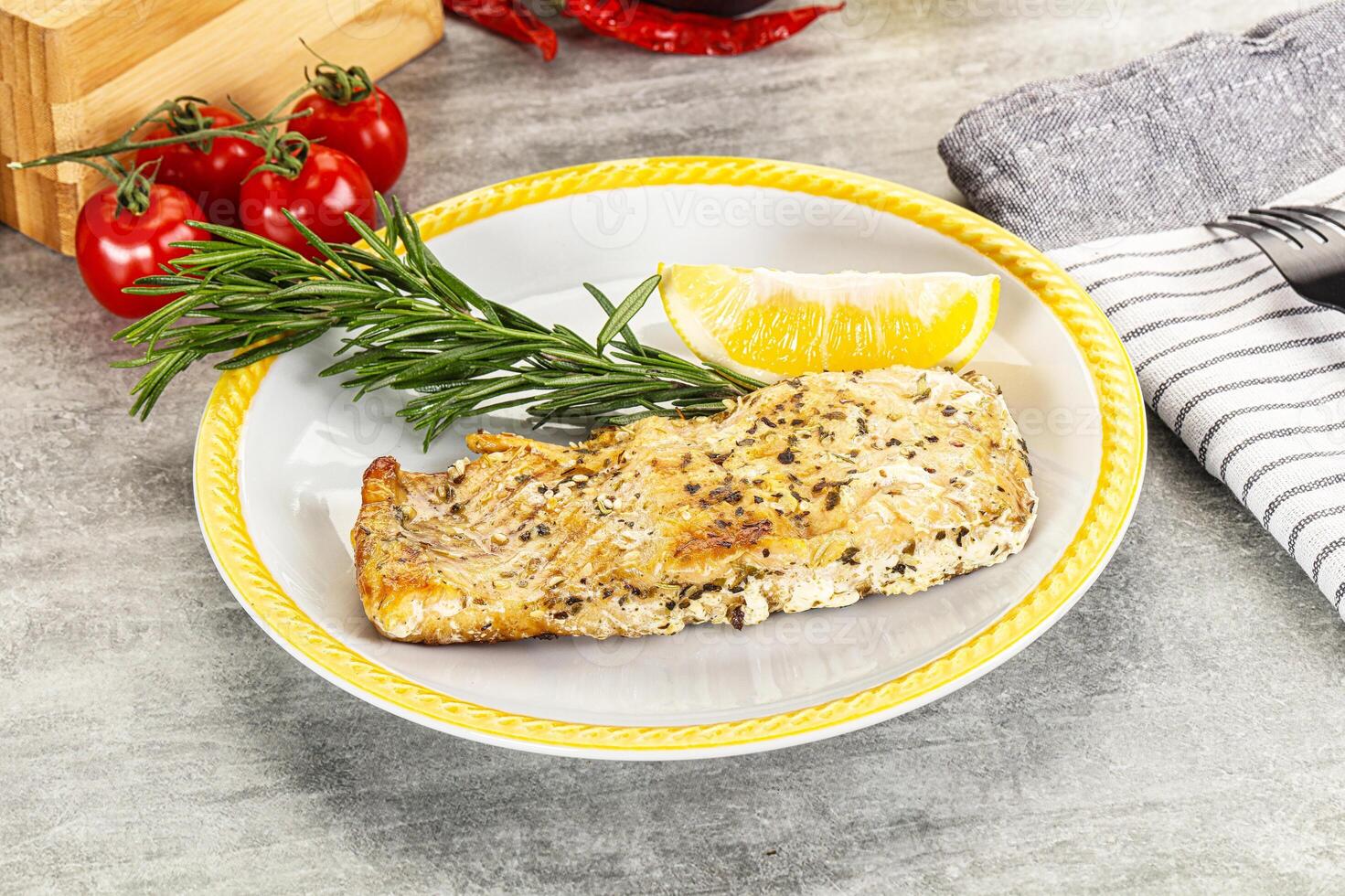 Baked salmon fish served rosemary photo