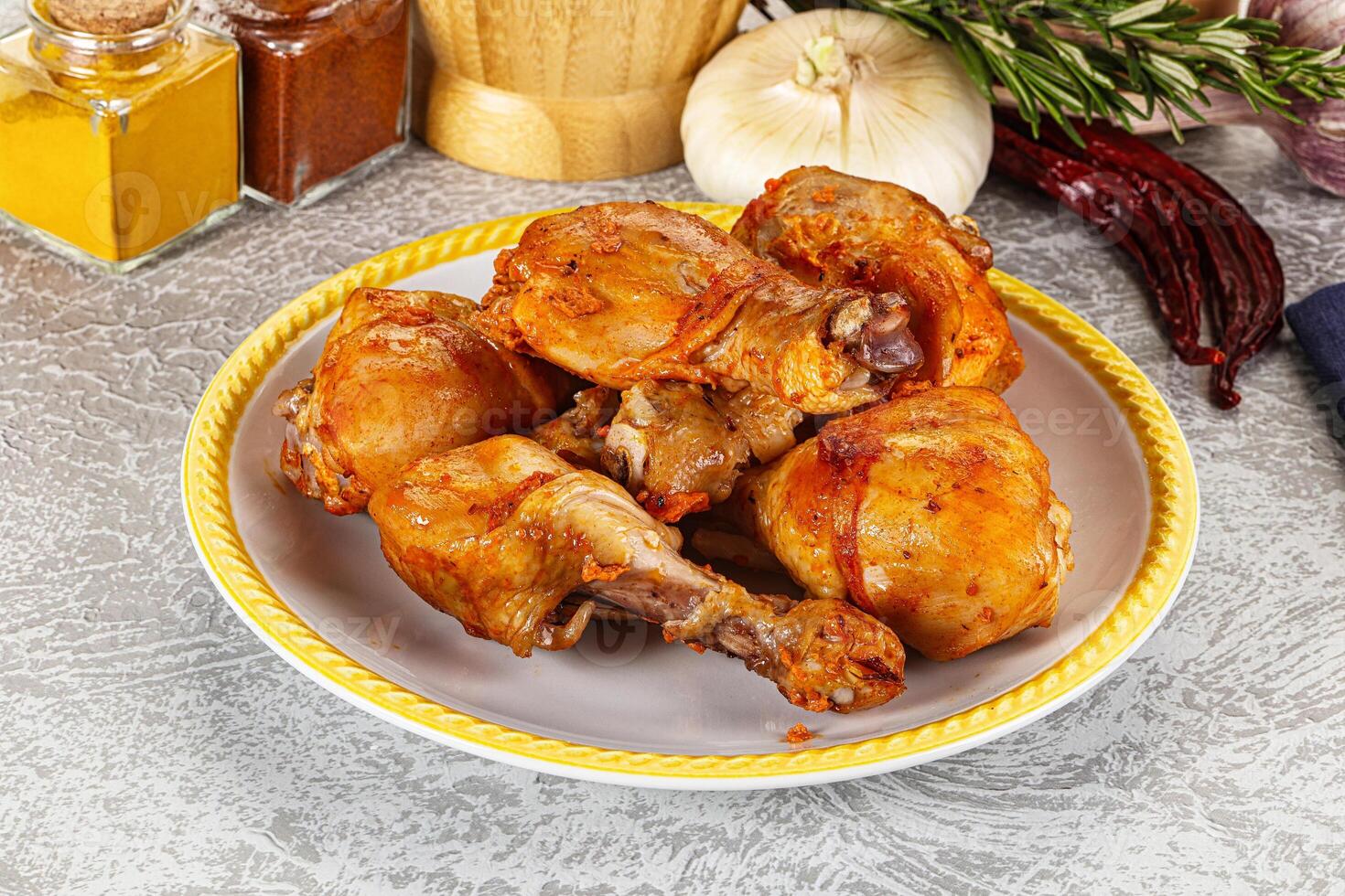 Raw marinated chicken drumstick for cooking photo