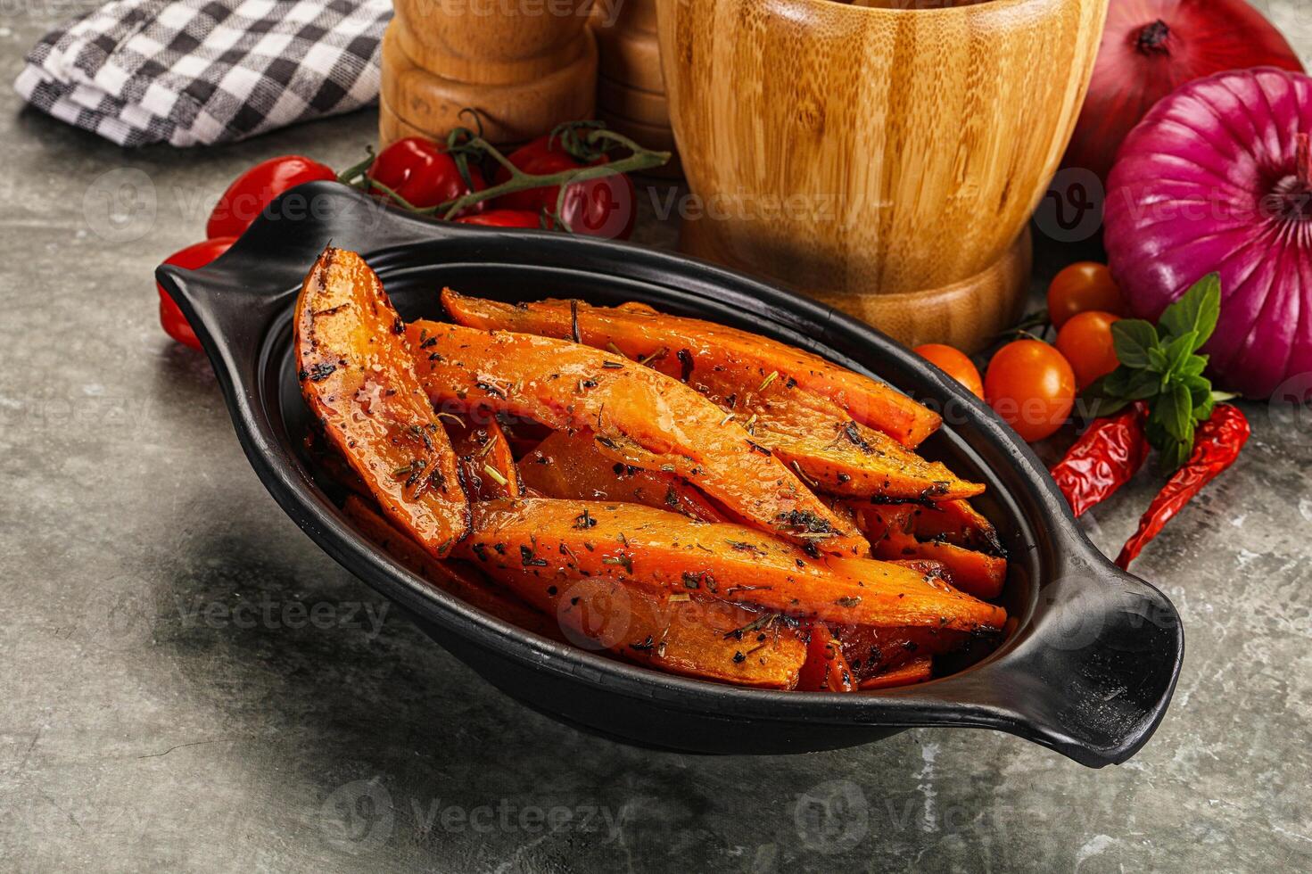 Baked batat with with spices photo