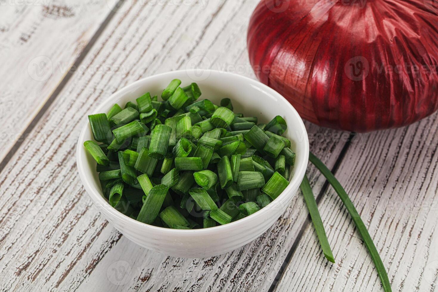 Diced green onion in the bowl photo