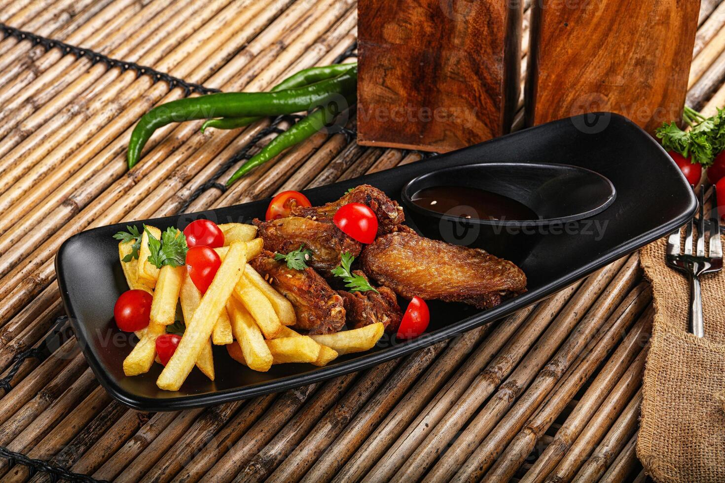Fried chicken wings with french potato photo