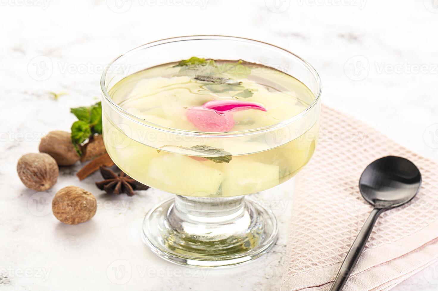 Sweet pineapple jelly with mint photo
