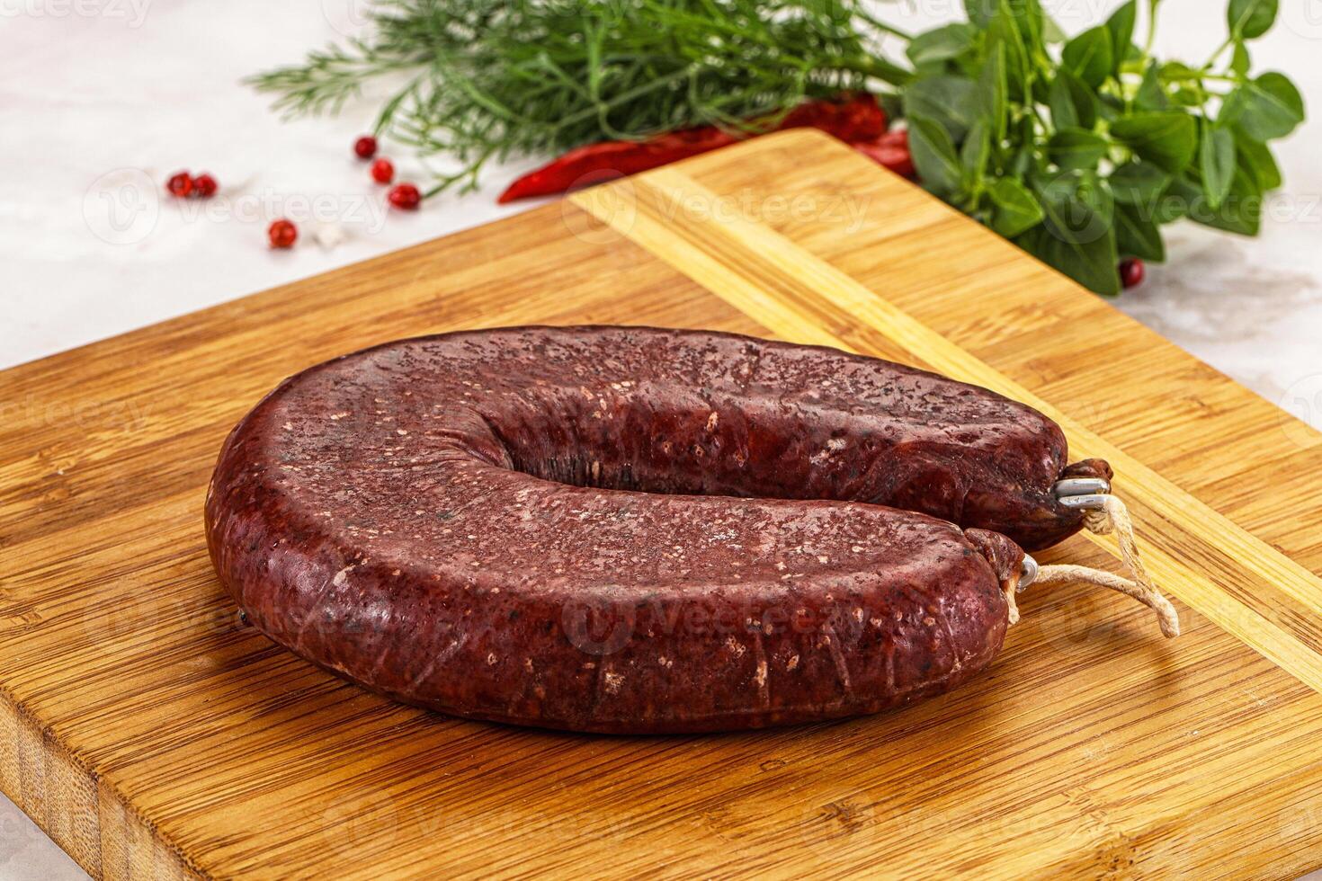 Delicious dry cured beef basturma on table, closeup photo