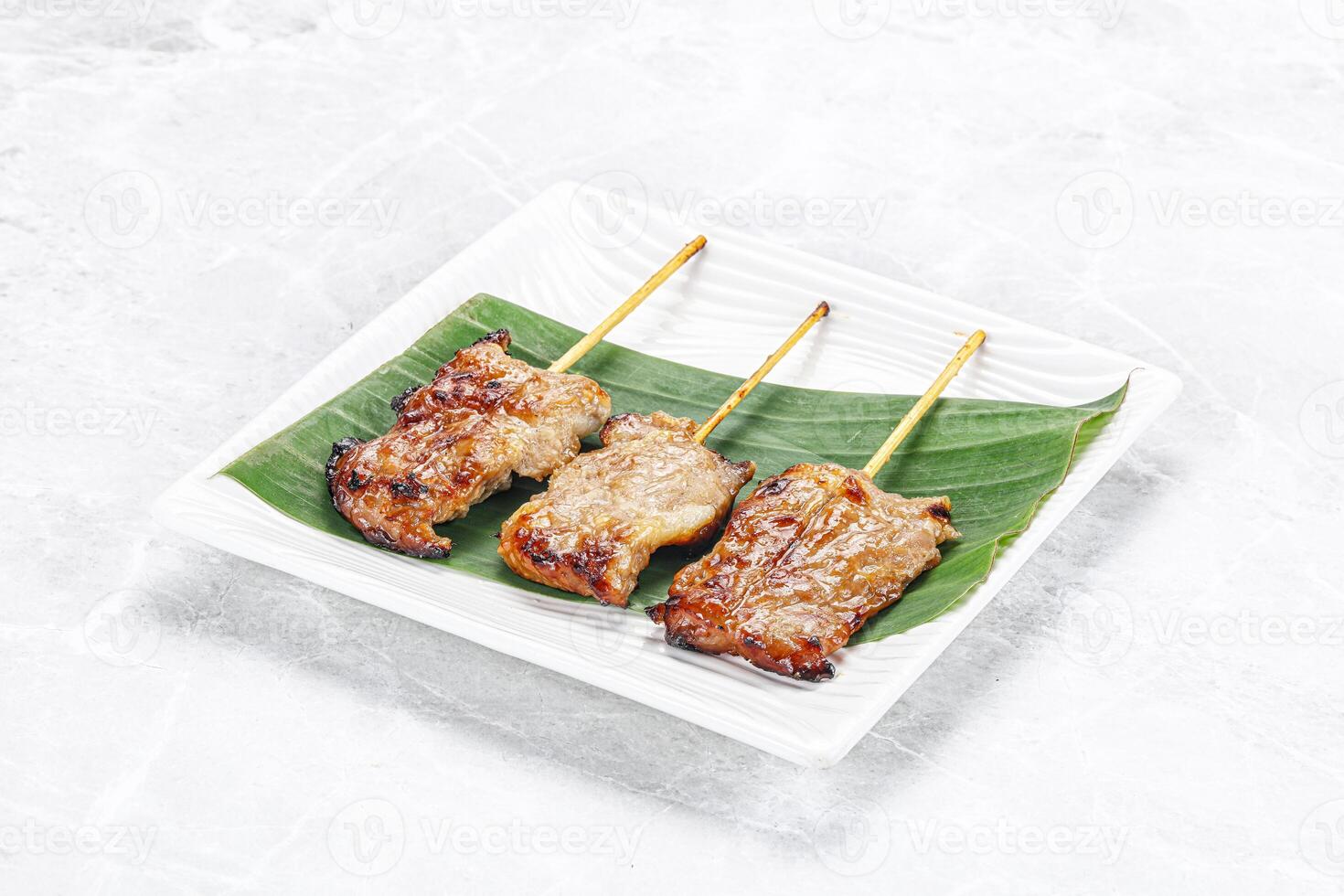 Thai cuisine - grilled pork skewer photo