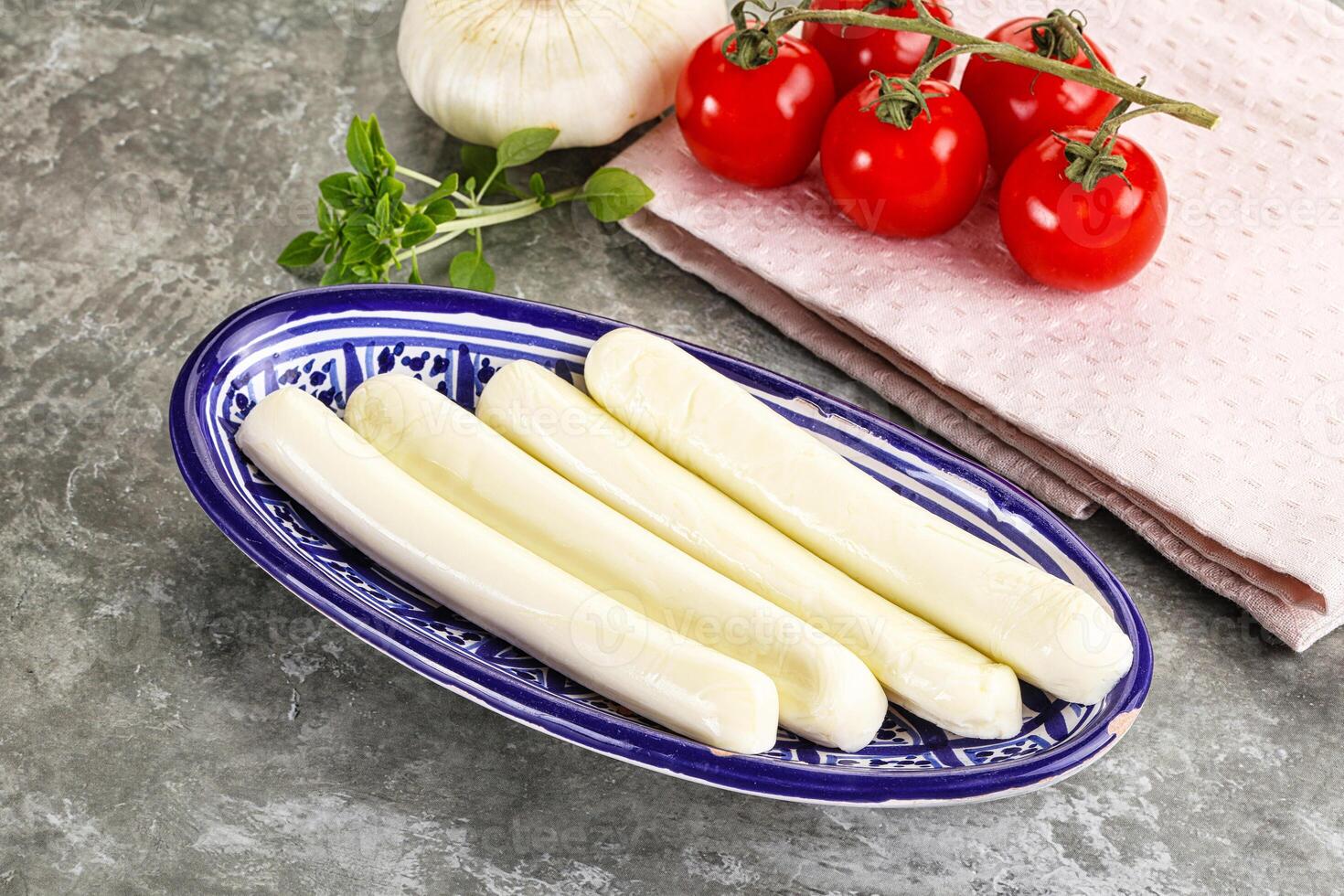 Mozzarella cheese stick heap snack photo