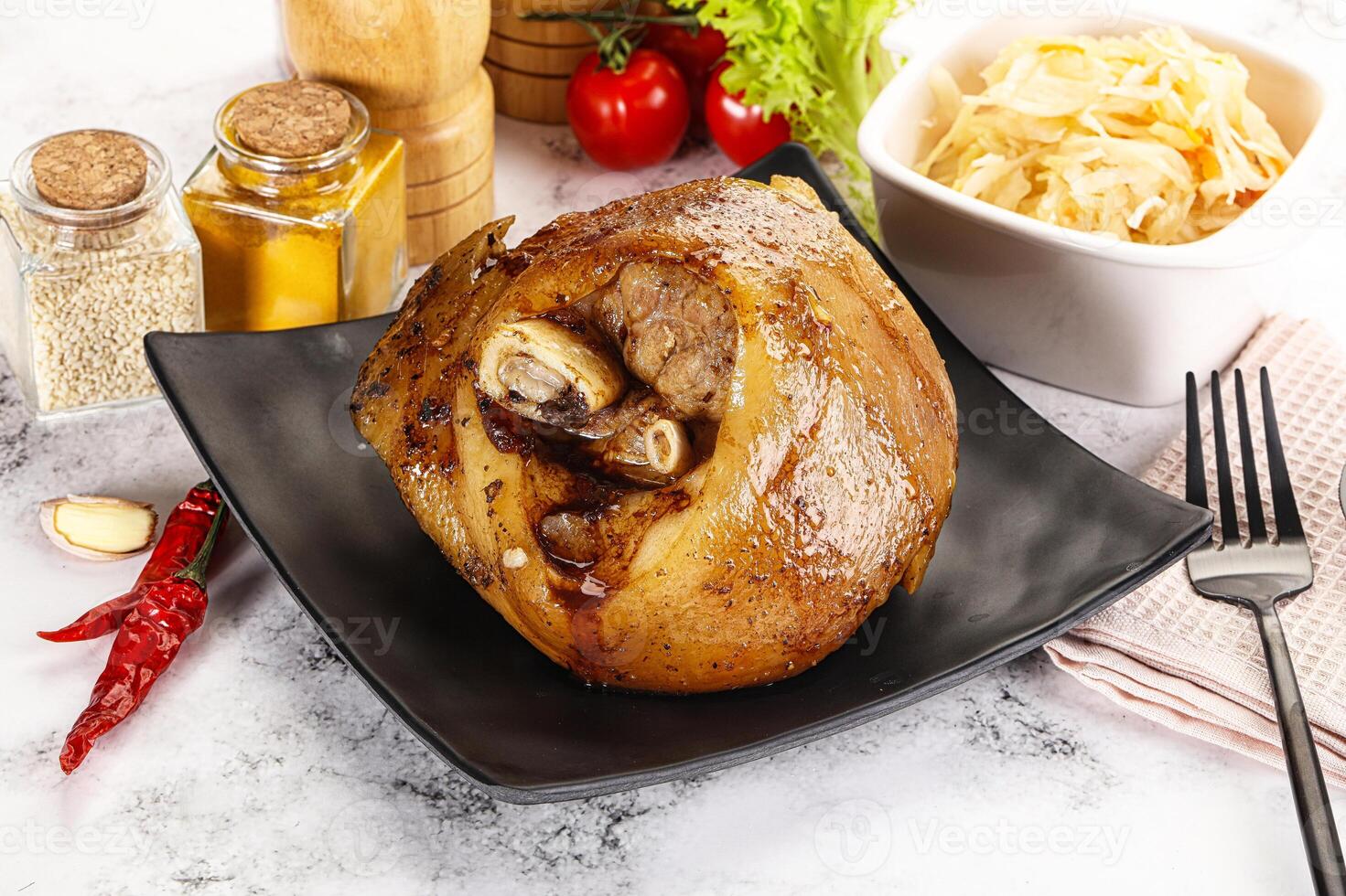 Baked pork knee with spices photo