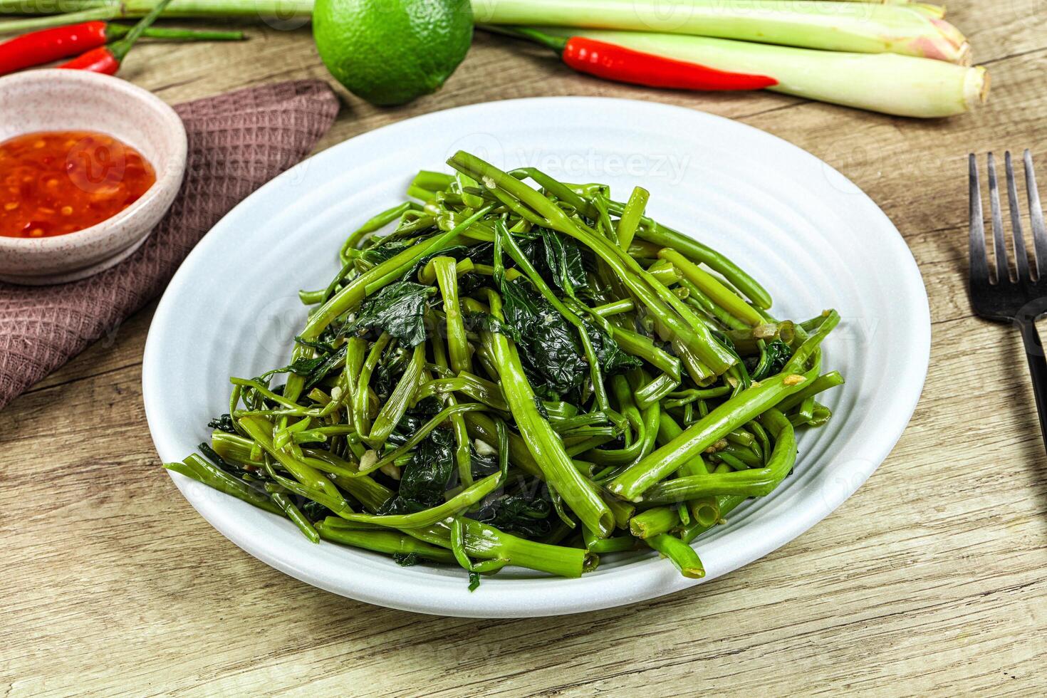Asian cuisine stir fried morning glory photo