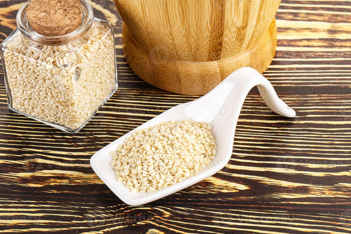 Sesame seeds heap in the bowl photo