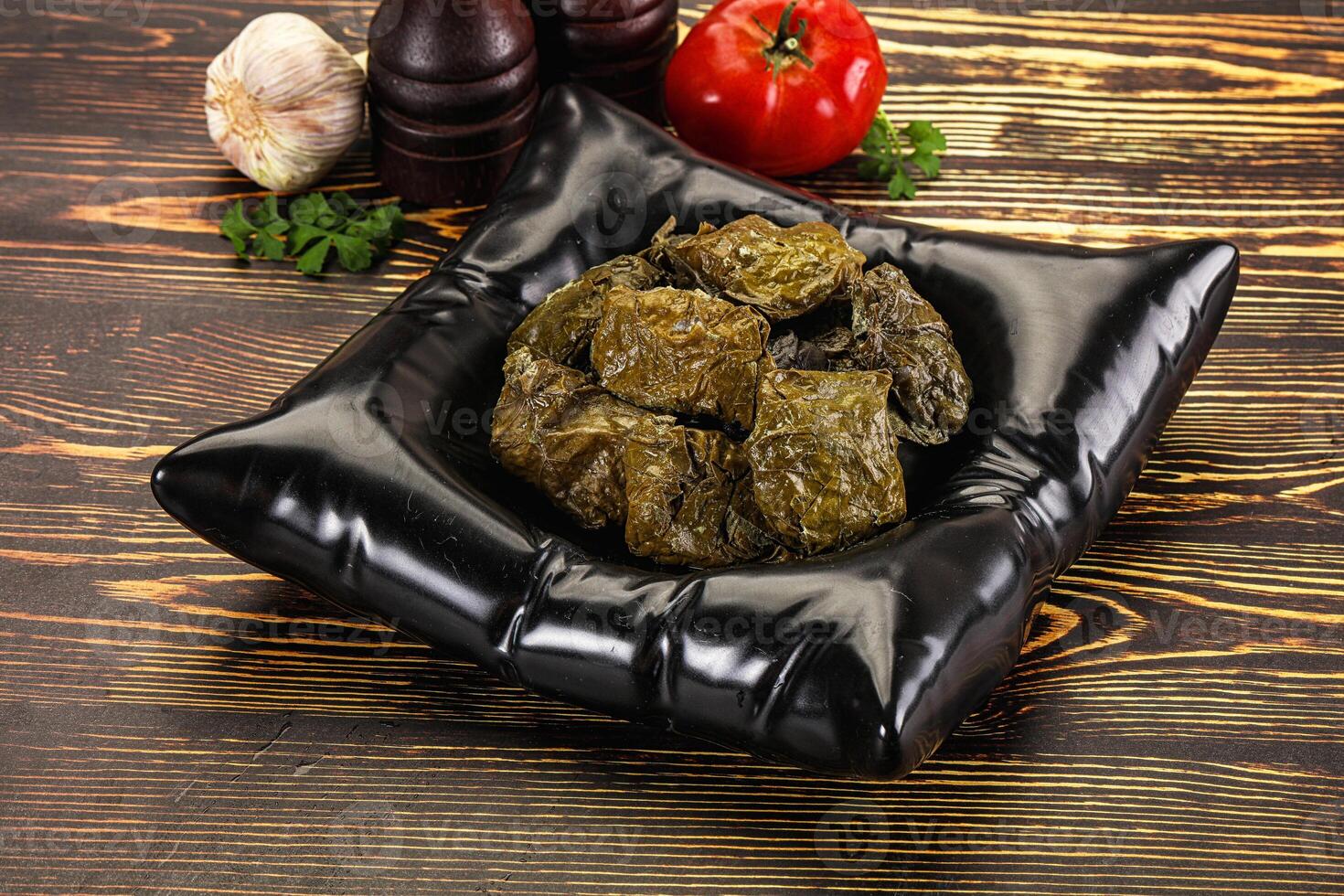 Stuffed dolma - meat in grape leaves photo