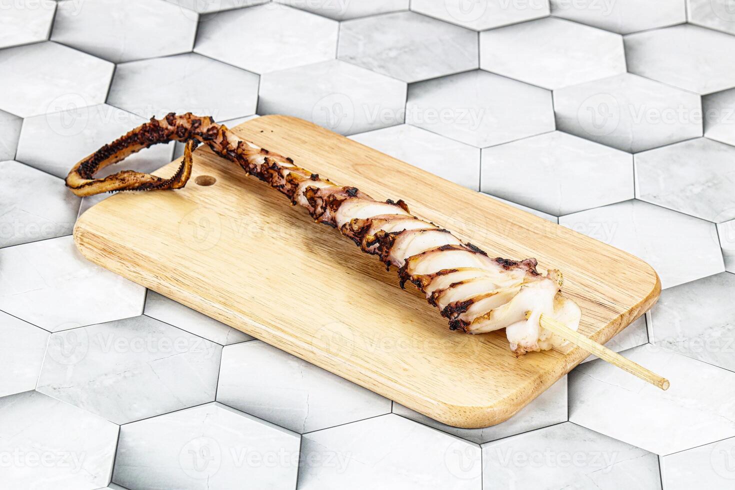 Delicous tasty Grilled octopus tentacle photo