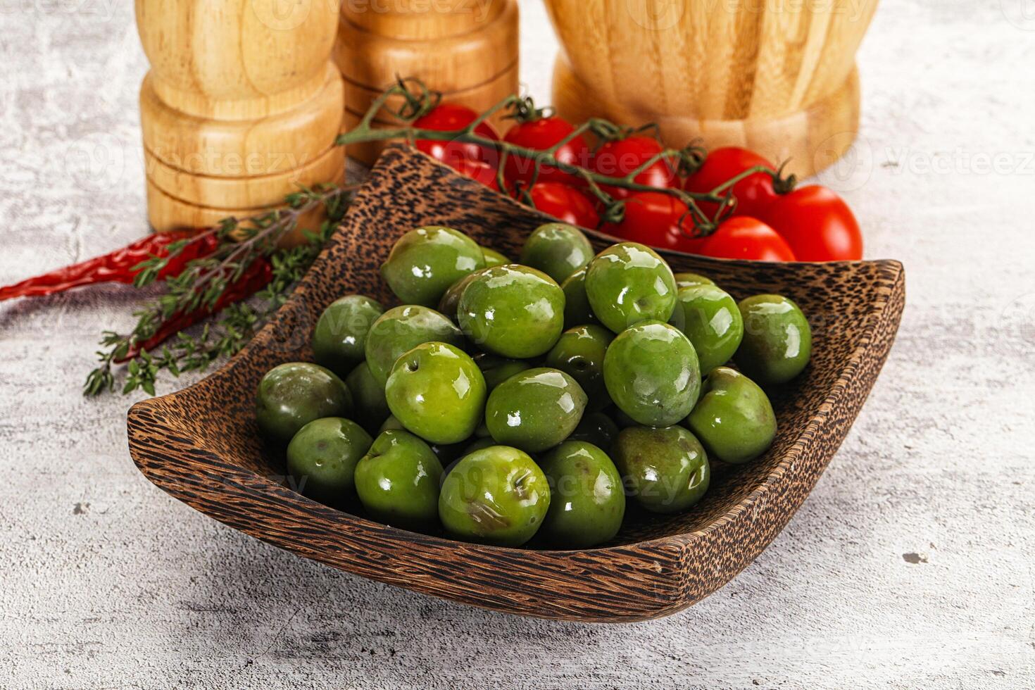Green marinated Italian Selezione olives photo