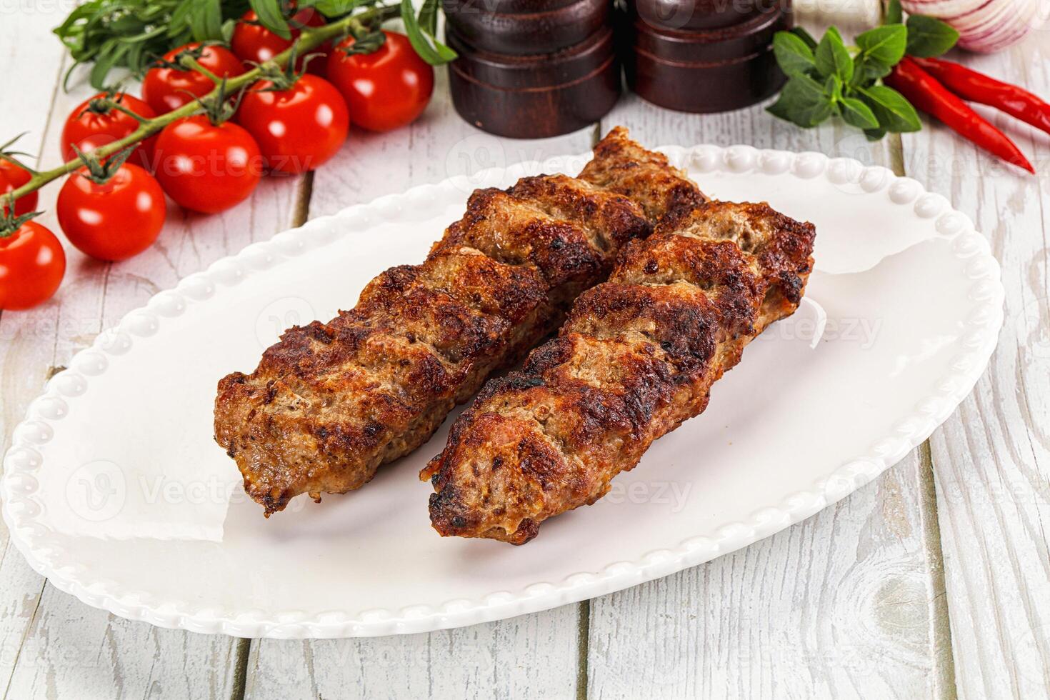Chicken kebab minced meat and spices photo