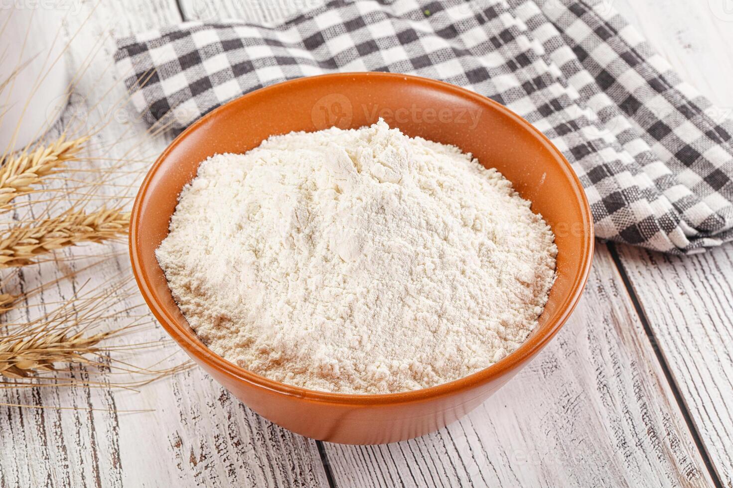 Wheat flour heap for bake photo