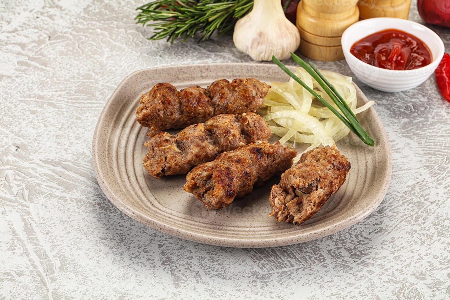 Beef kebab minced meat with onion photo