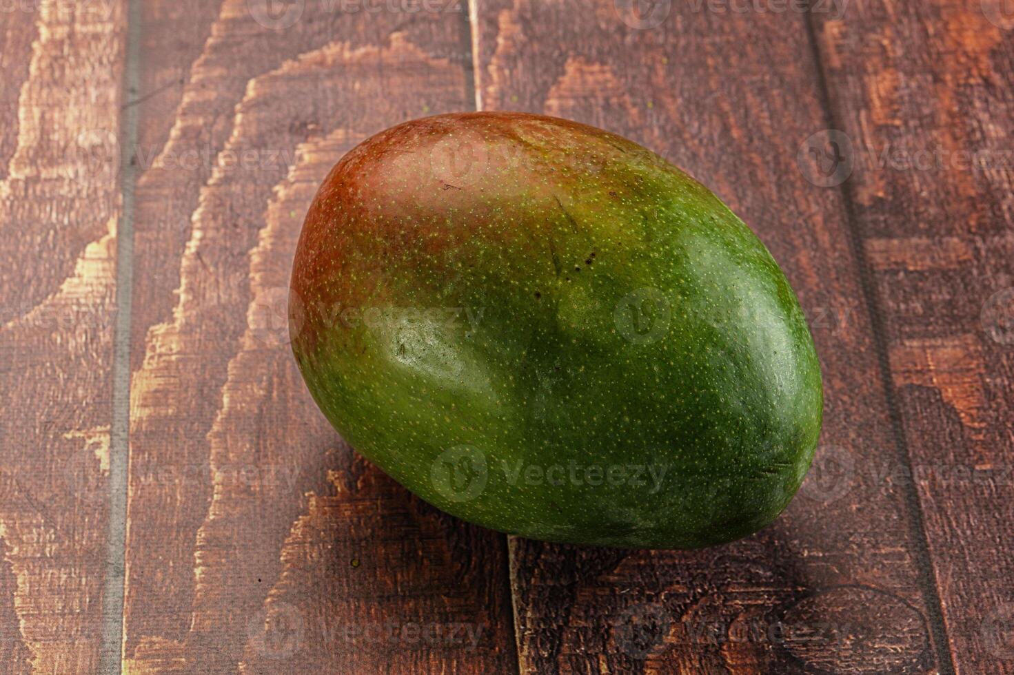 Sweet juicy green and red mango photo