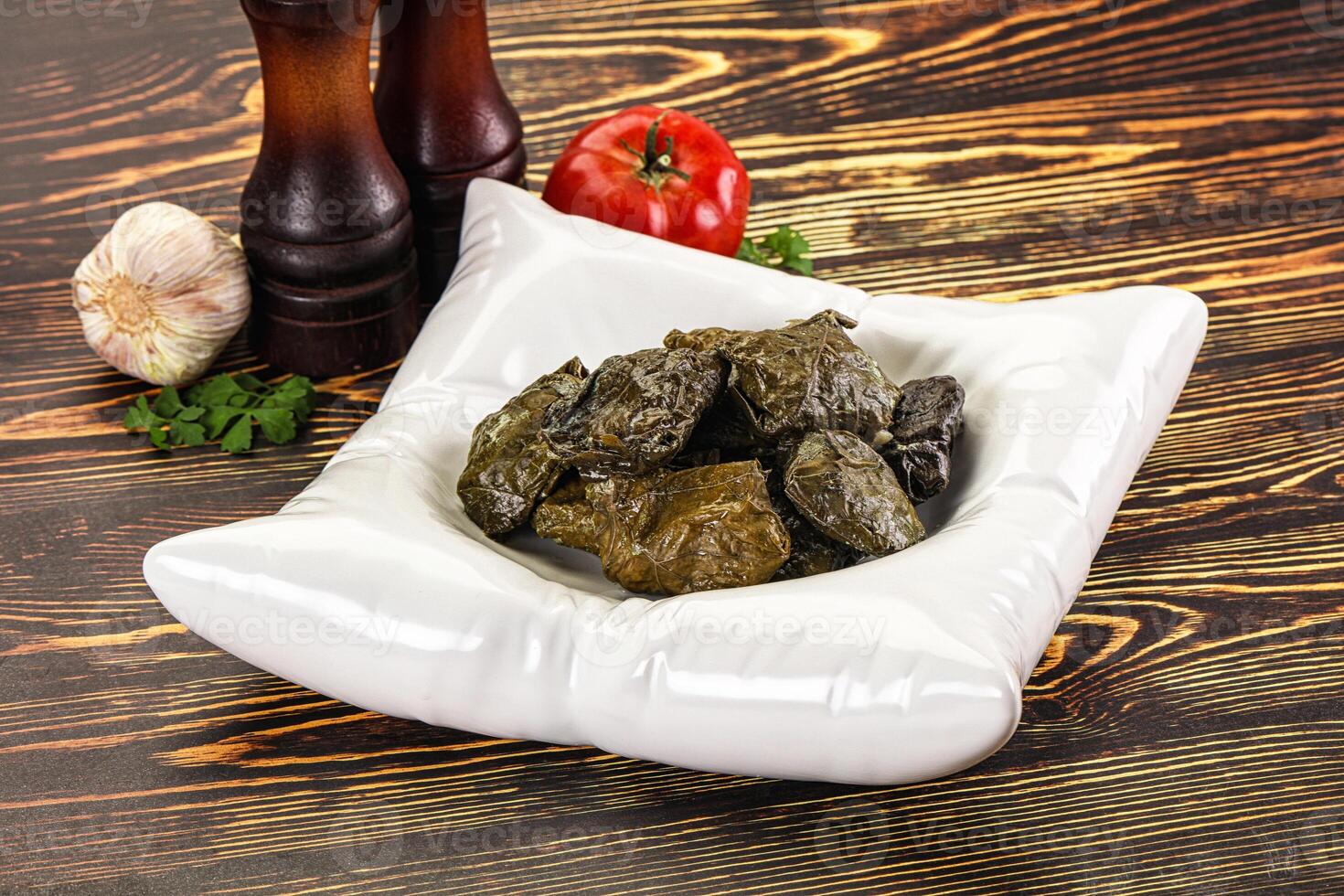 Stuffed dolma - meat in grape leaves photo