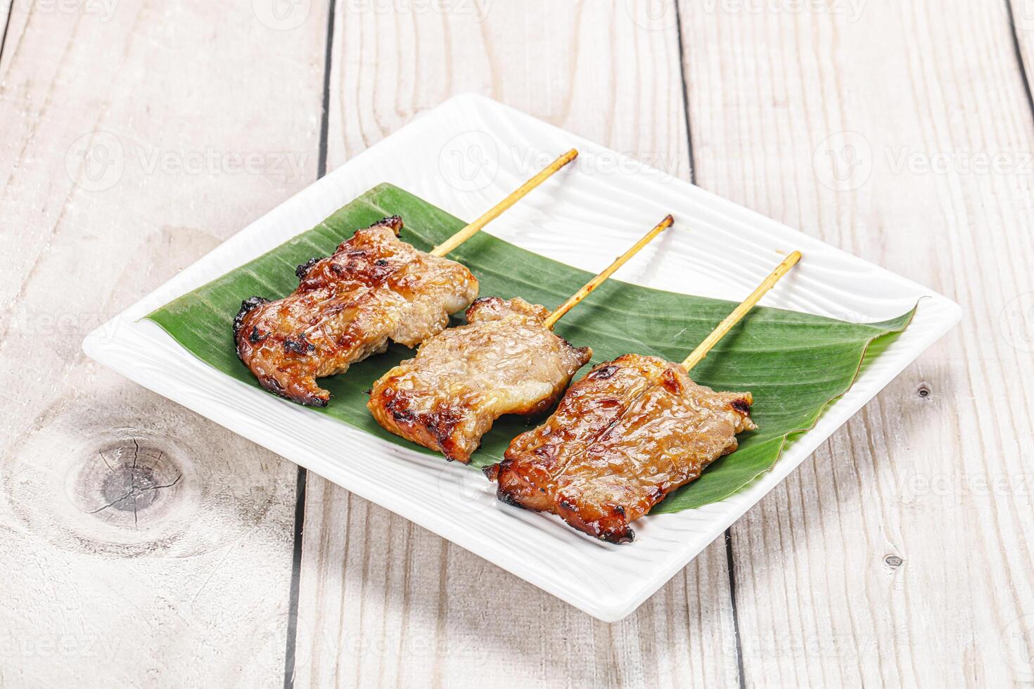 Thai cuisine - grilled pork skewer photo