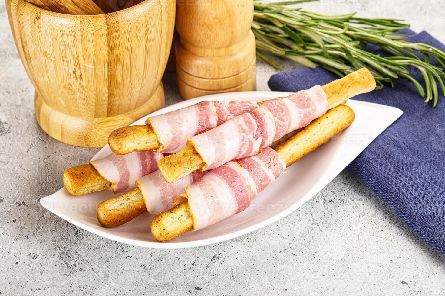 Crispy grissini italian bread with bacon photo