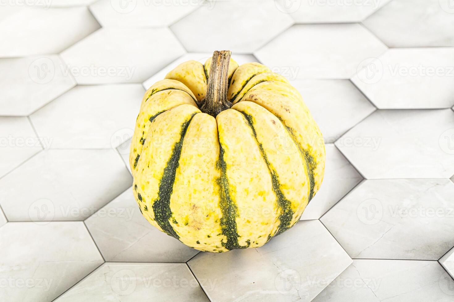Ripe raw fresh decorative pumpkin photo