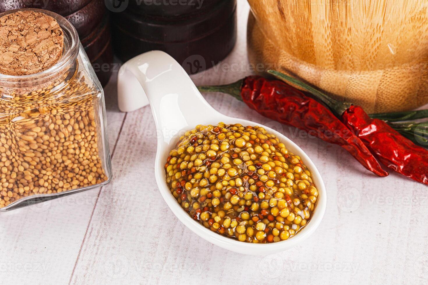 Spicy mustard sauce with seeds photo