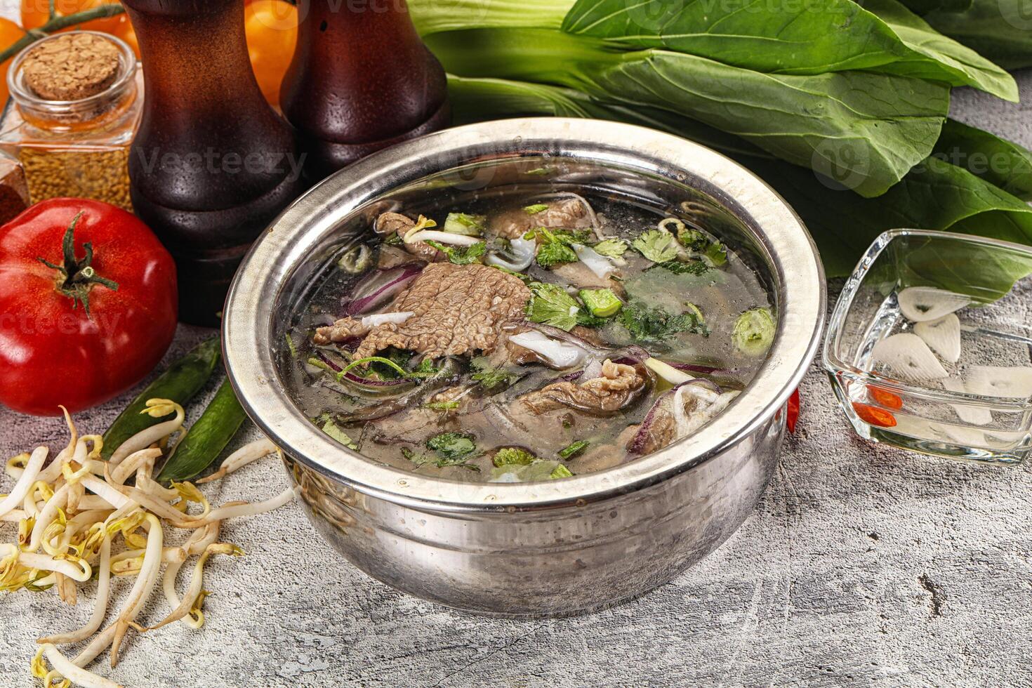 Vietnamese cuisine - Pho Bo soup with beef photo