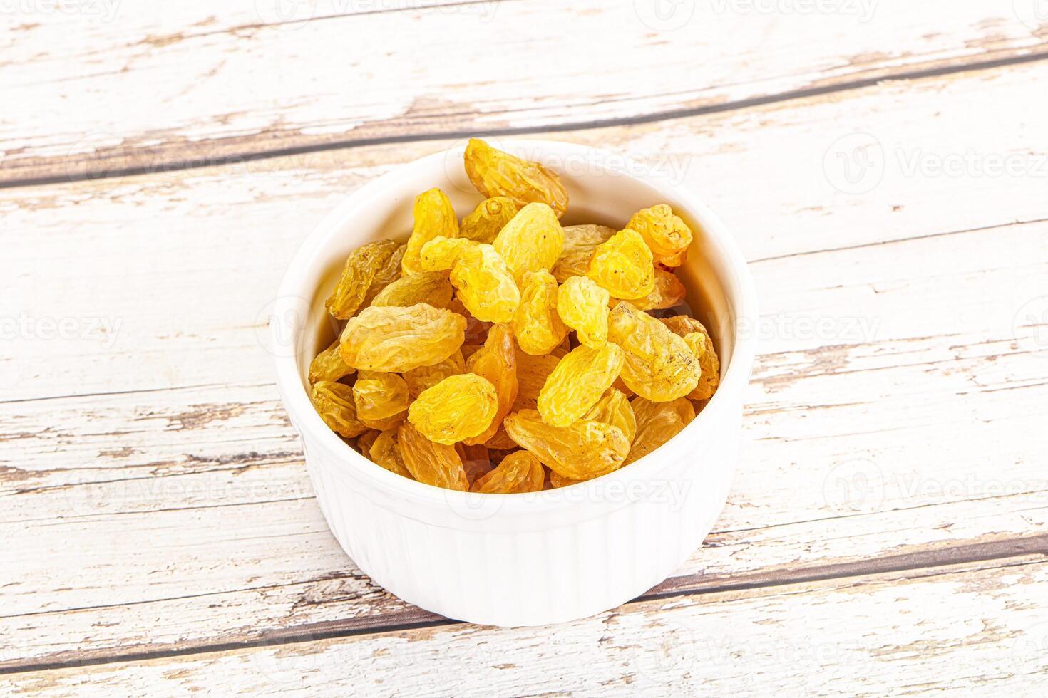 Yellow raisin - dry grape berries photo