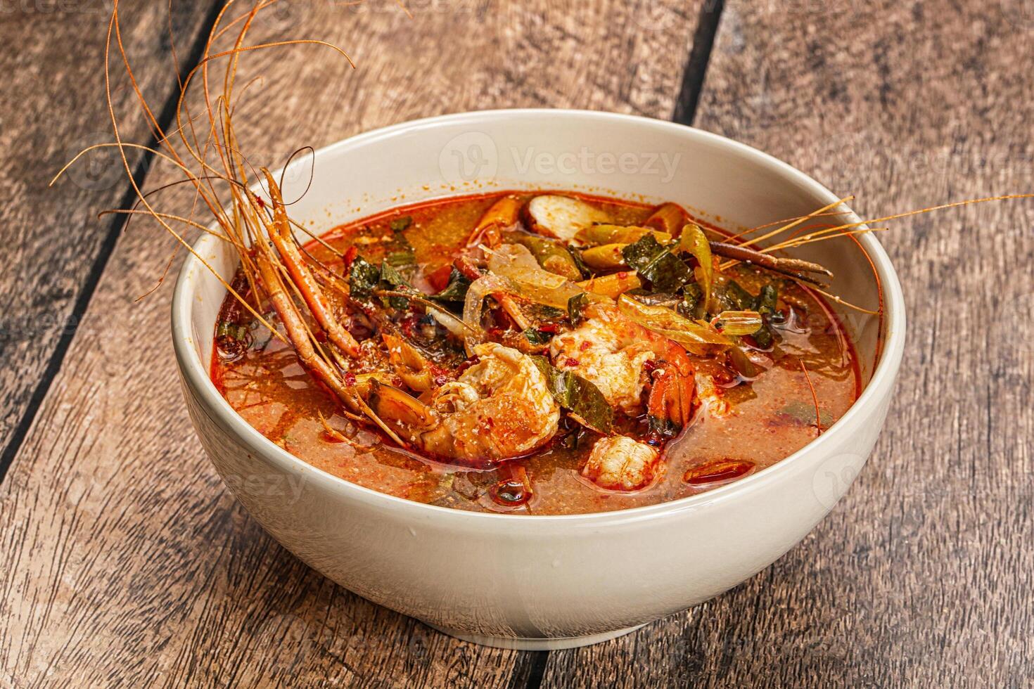 Thai traditional cuisine - Tom Yum soup photo