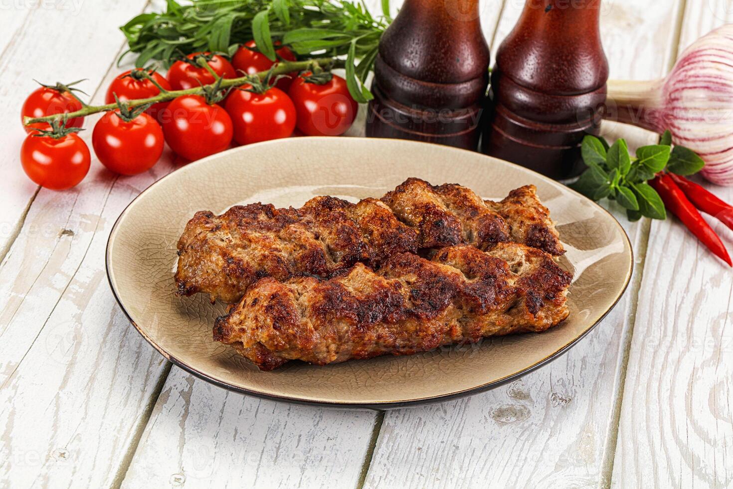 Chicken kebab minced meat and spices photo