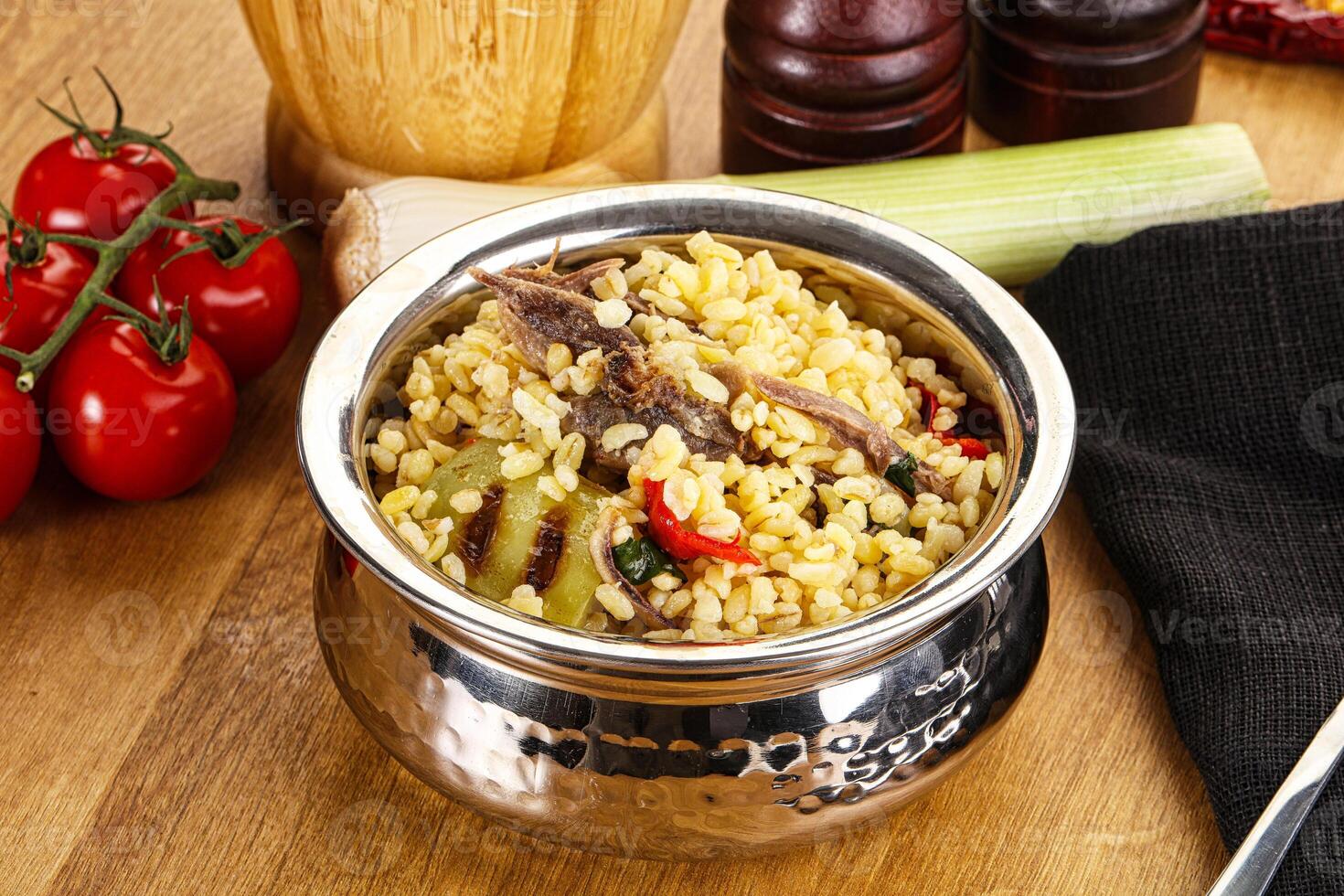Bulgur with lamb and vegetables photo