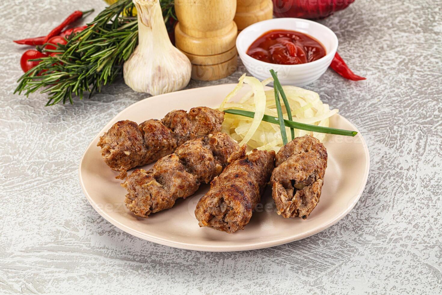 Beef kebab minced meat with onion photo