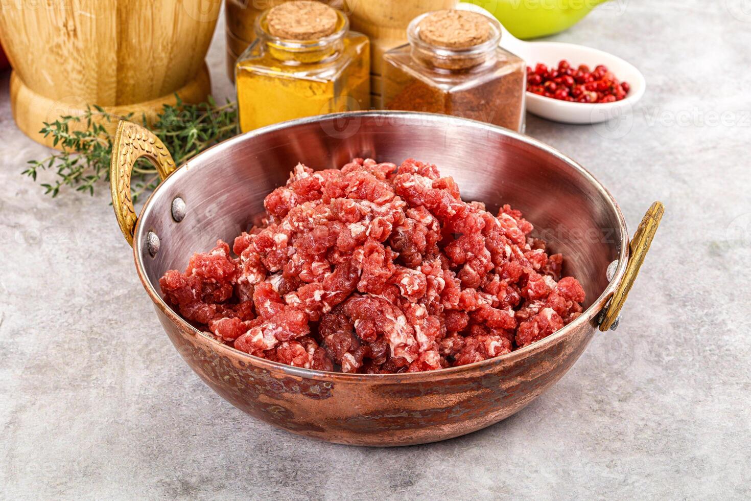 Raw beef minced meat for cooking photo