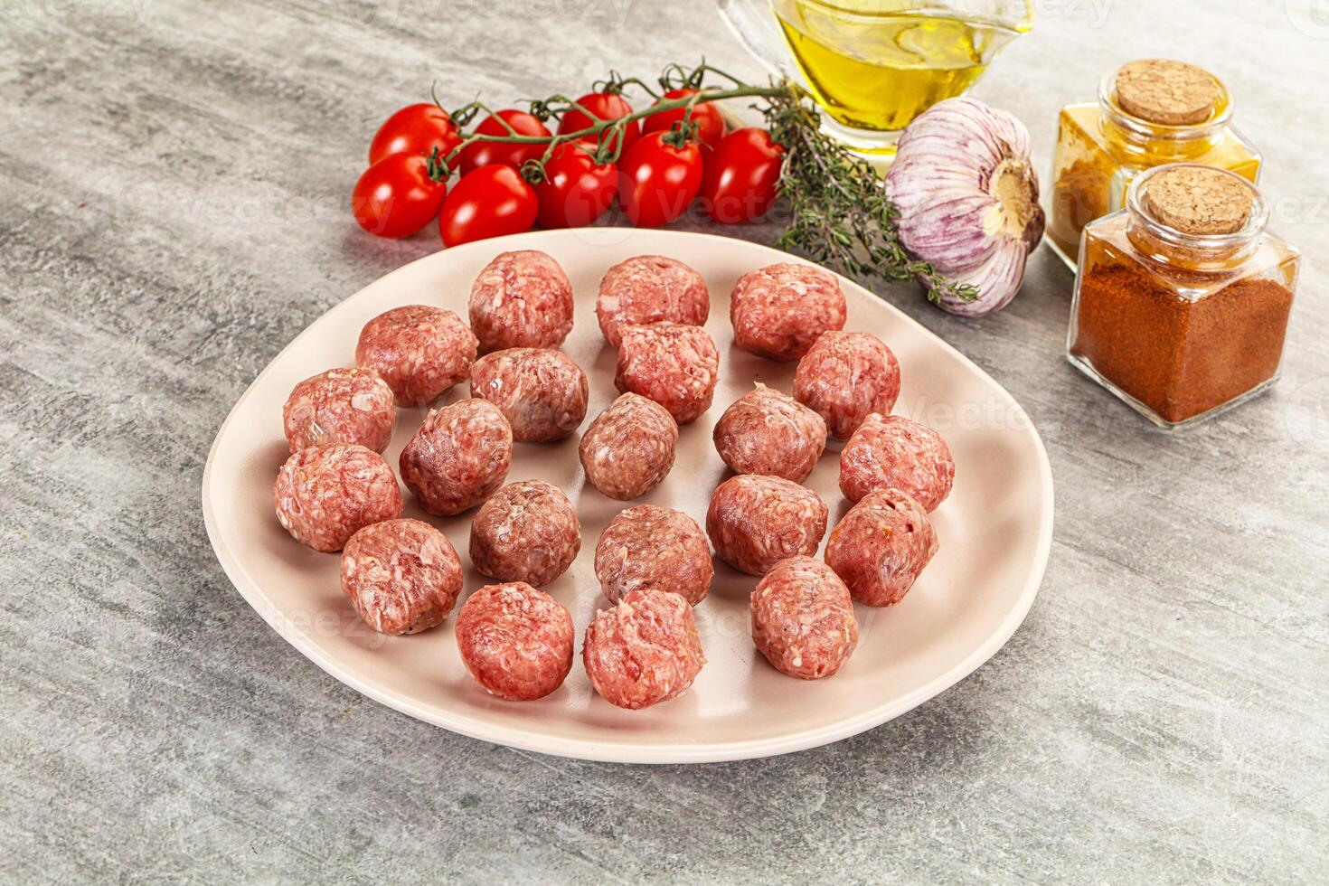 Uncooked raw beef meatball minced photo
