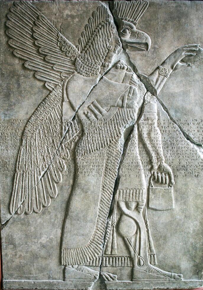 Berlin, Germany, July 24 2009, Assyrian Relief of Winged Beings in Berlins Pergamon Museum photo