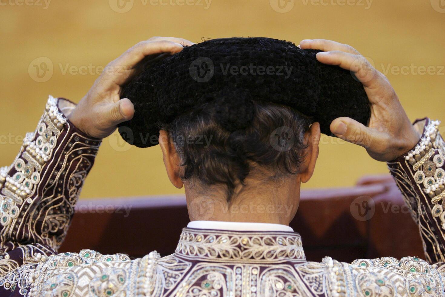 Bullfighter Adjusts Hat at Sevilles Real Maestranza, Aug 2006 photo