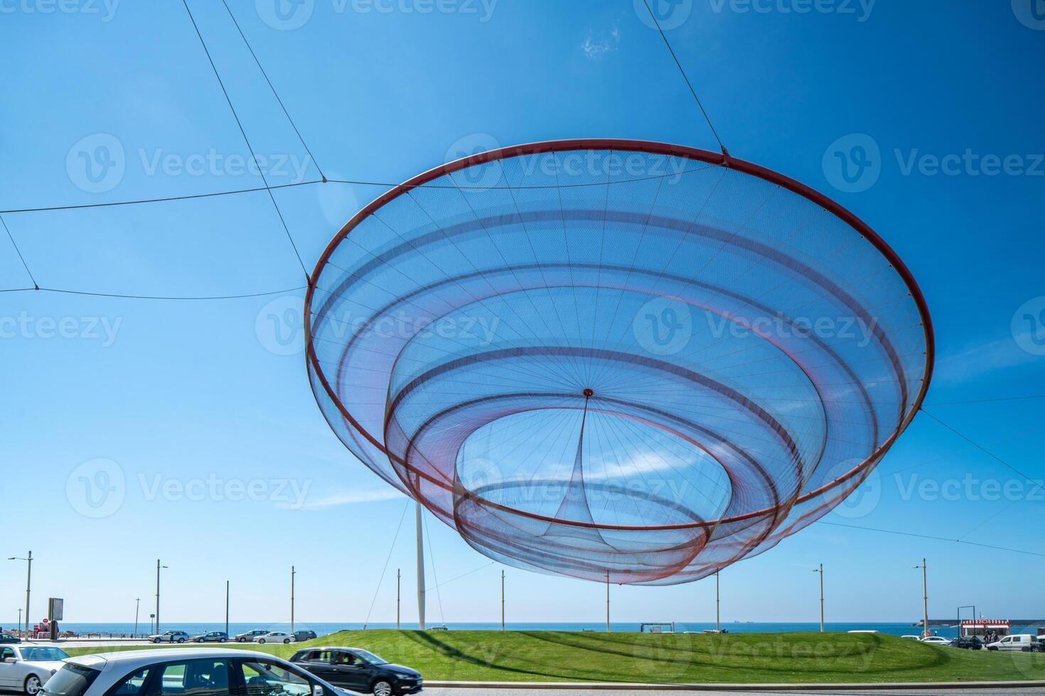 She Changes Sculpture in Matosinhos, Porto under Blue Sky photo